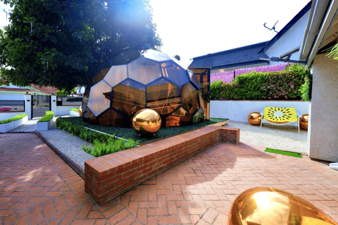 The Casa de Bloom glass dome and gold spheres